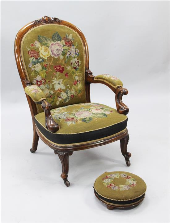 A Victorian walnut open armchair, W.2ft 4in. H.3ft 5in.